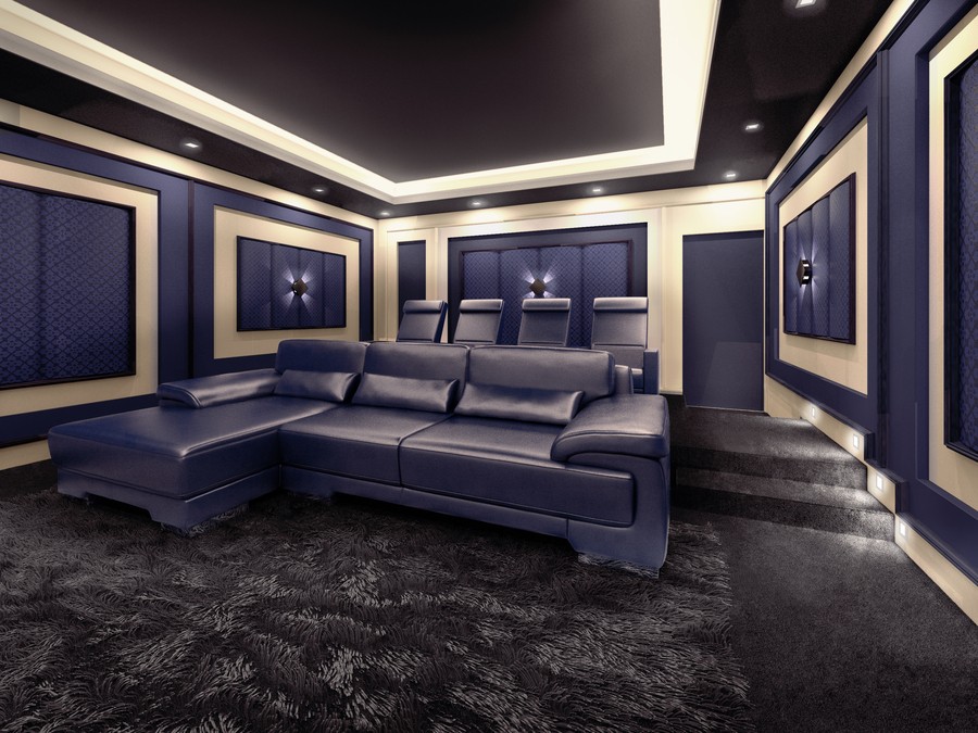 Leather home theater seating in two rows within a room featuring blue walls and gray carpeting. 